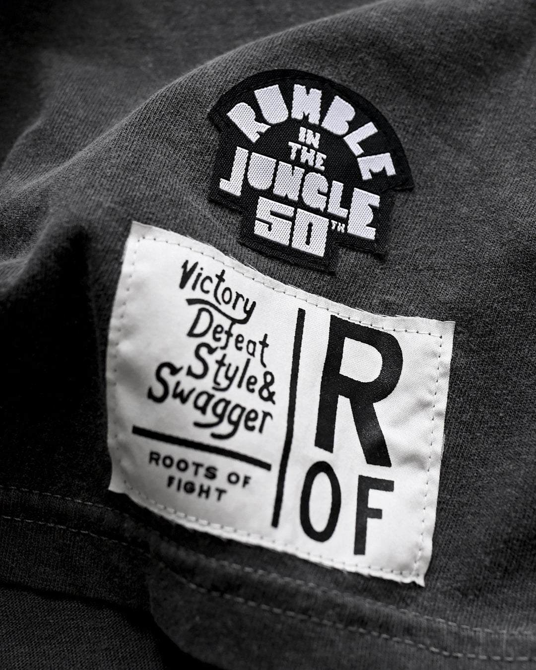 Ali Rumble in The Jungle Charcoal Long Sleeve Tee - Roots of Fight