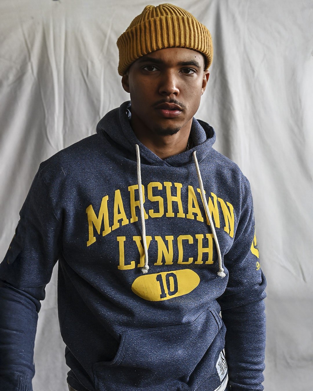 CAL - Marshawn Lynch #10 Navy PO Hoody - Roots of Fight
