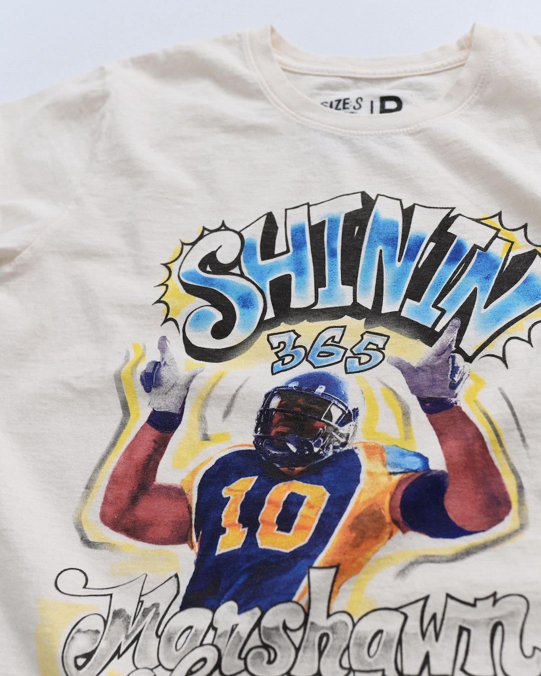 CAL - Marshawn Lynch Shinin' 365 White Tee - Roots of Fight