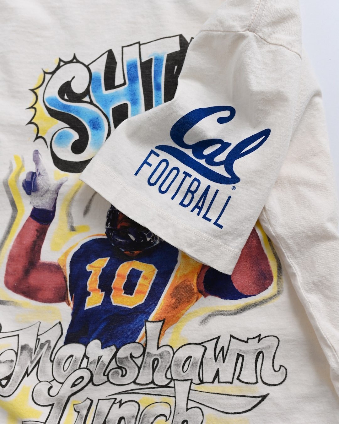 CAL - Marshawn Lynch Shinin' 365 White Tee - Roots of Fight