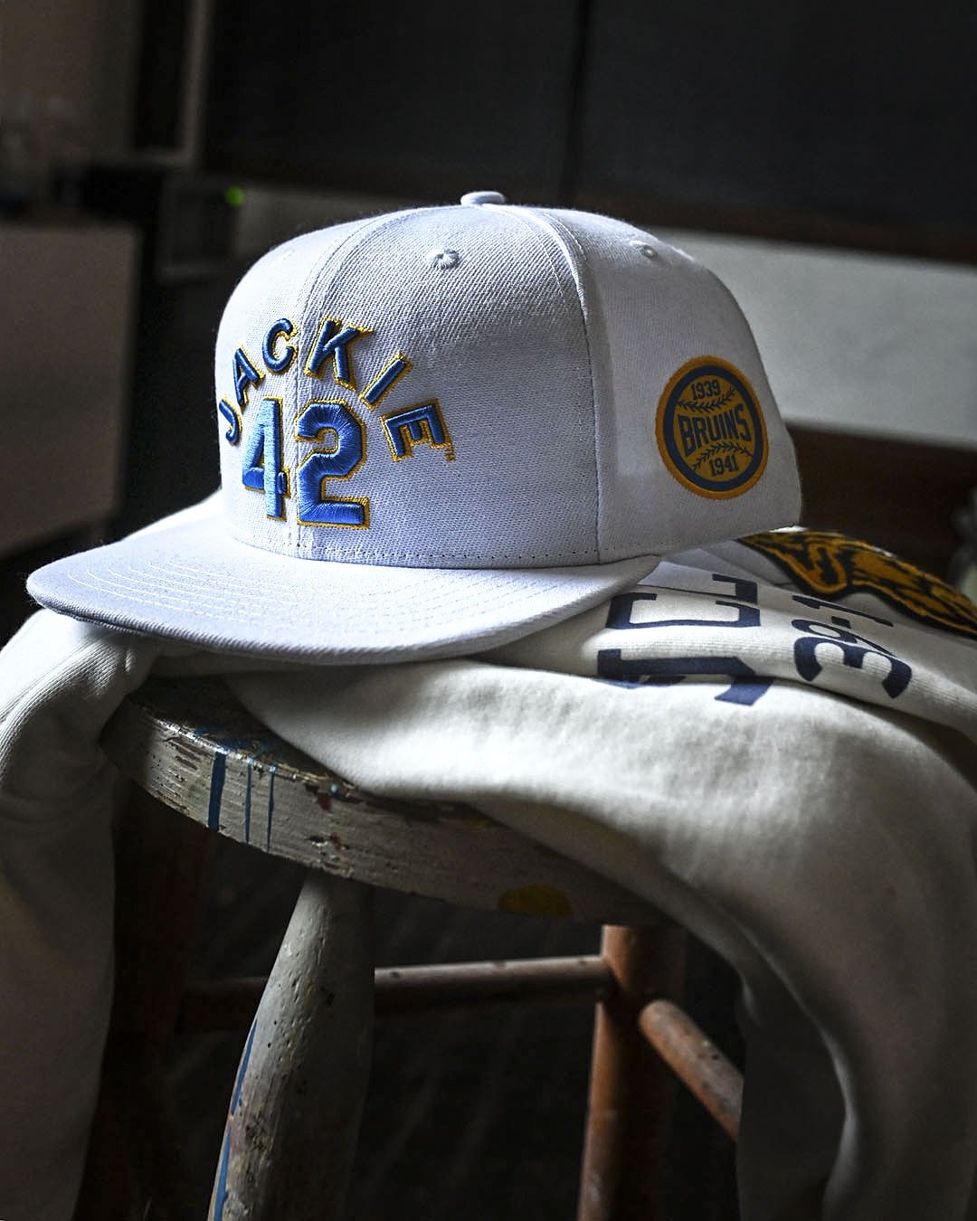UCLA - Robinson Legacy #42 White Snapback Hat - Roots of Fight
