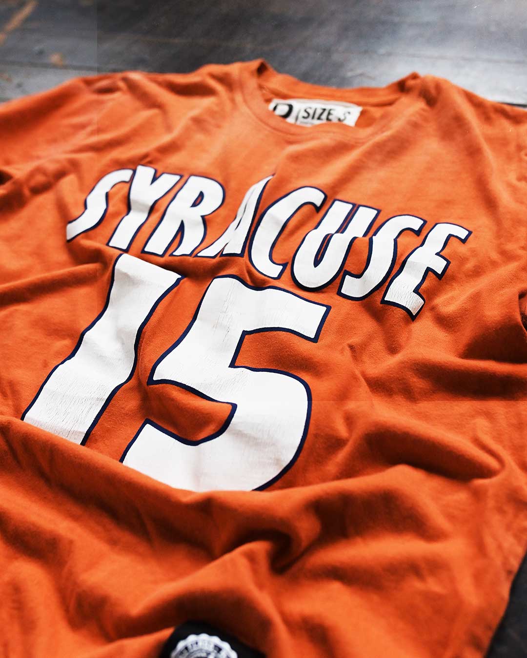 Melo Syracuse #15 Orange Tee - Roots of Fight