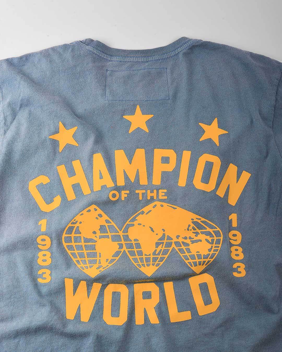 The Iron Sheik 1983 Champ Blue Tee - Roots of Fight